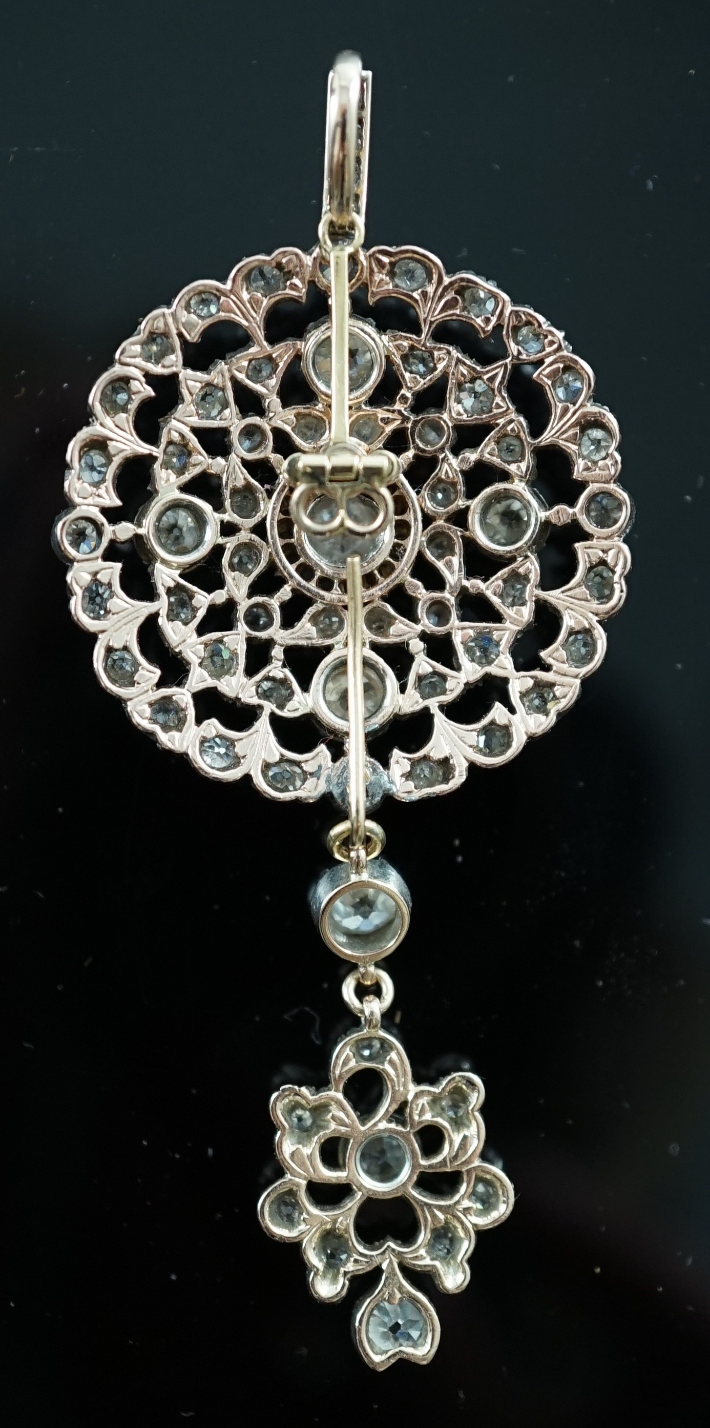 A good Victorian gold, silver and graduated diamond cluster set target drop pendant brooch, retailed by Carlo & Arthur Giuliano